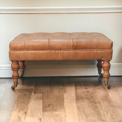 Buffalo Tan Leather Ottoman with Castor Legs